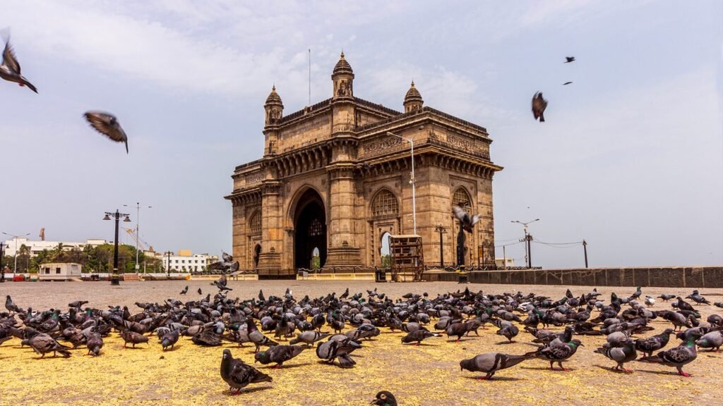 The Gateway of India is a monumental, 26-metre-tall Indo-Saracenic arch built on Mumbai's waterfront to commemorate the 1911 royal visit of King George V.